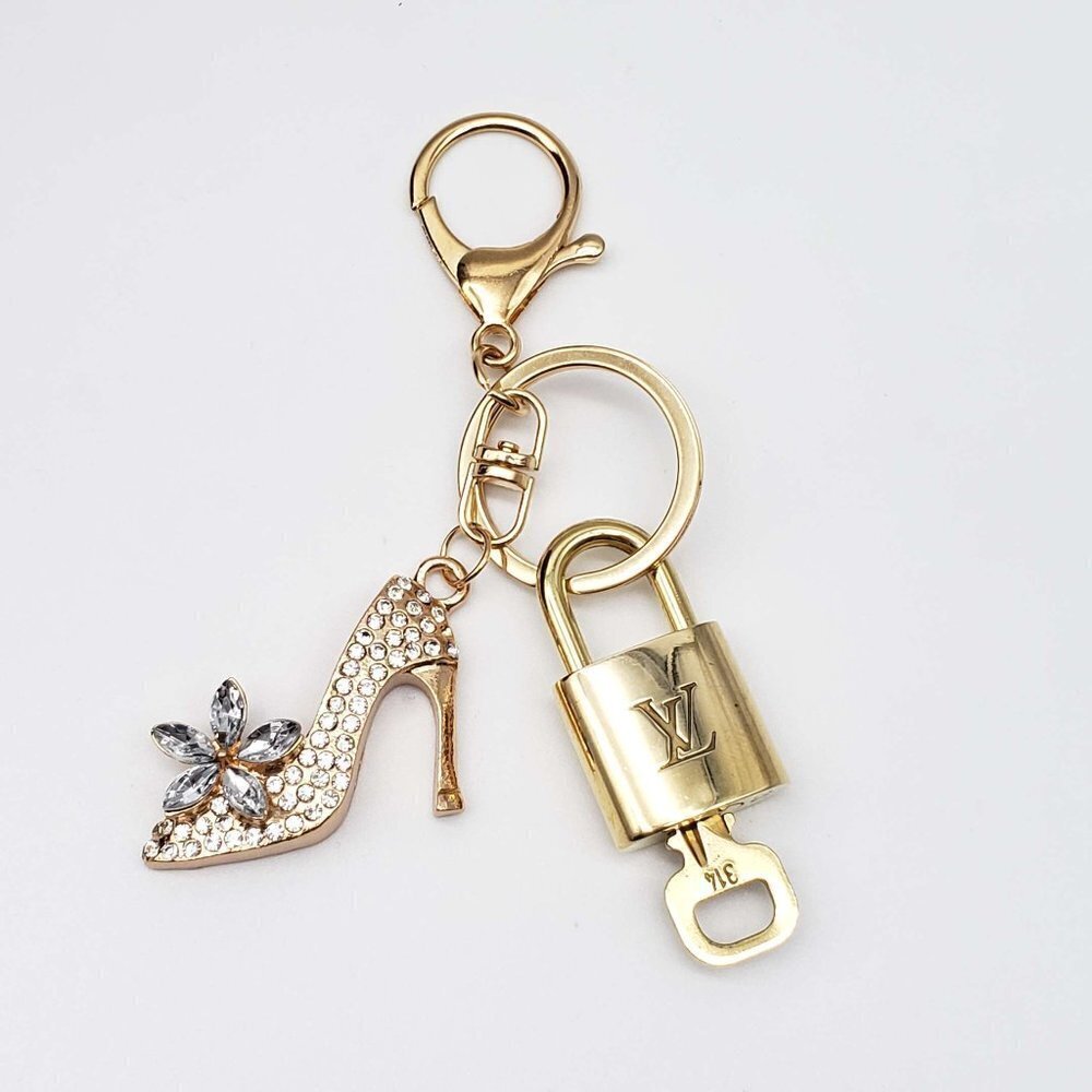 100% Auth Louis Vuitton Lock & Key with unbranded Bagcharm, Keycharm, Keychain